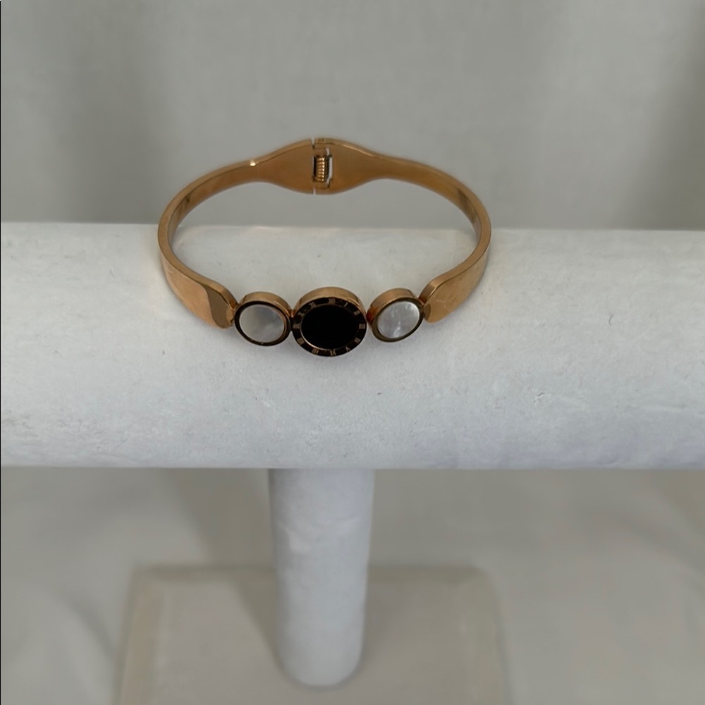 Elegant Gold and Black Bracelet